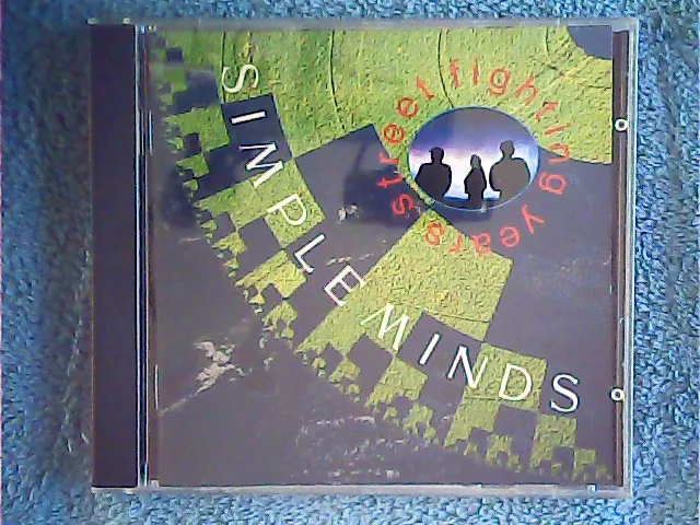 [MC-009153] Simple Minds - Street Fighting Years
