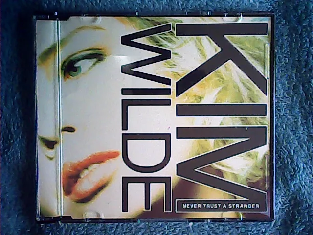[MC-009409] Kim Wilde - Never Trust A Stranger
