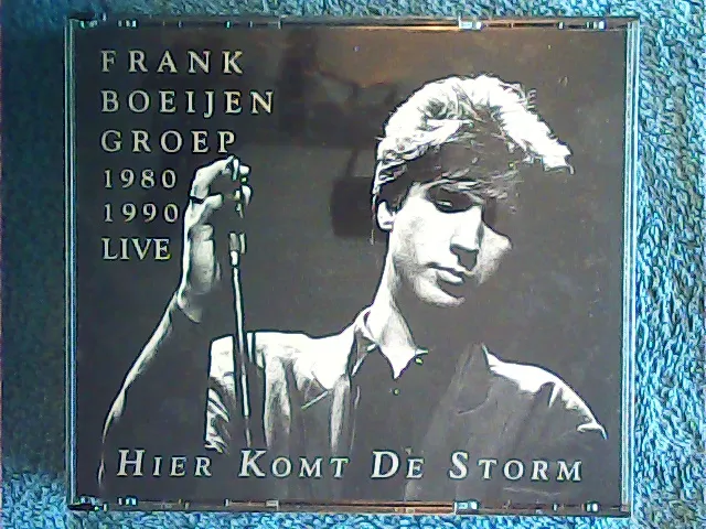 [MC-009497] Frank Boeijen Groep - 1980-1990 Live Hier Komt De Storm